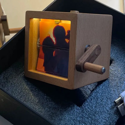 Hand-cranked photo album with light