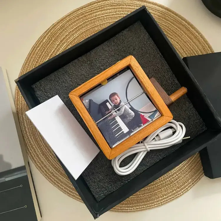 Hand-cranked photo album with light