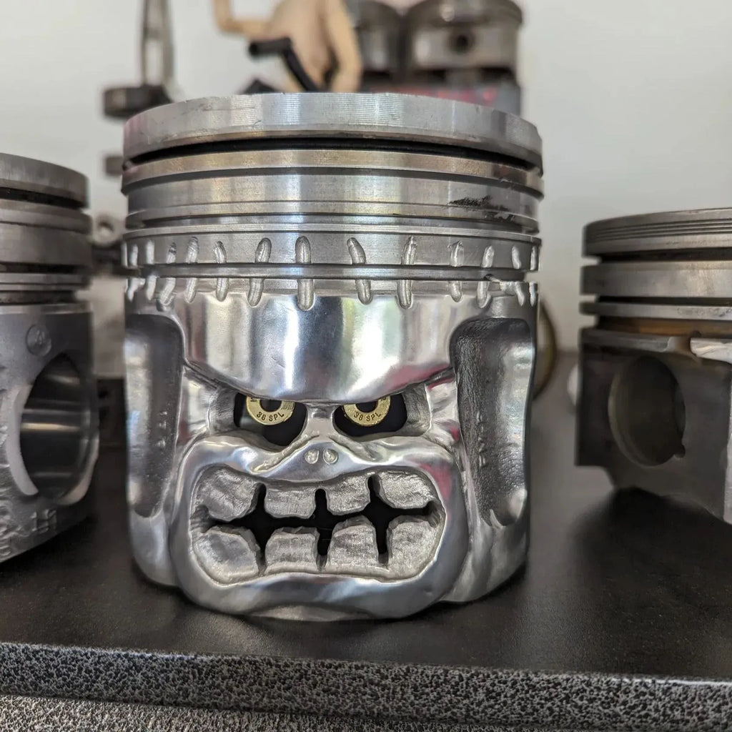 Piston Skull Face Sculpture