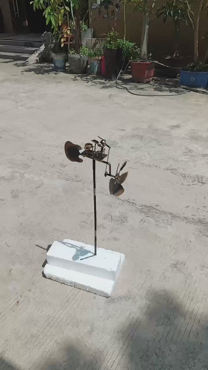 "Wind-Powered Air Drummer: The Silent Garden Rockstar!"🥁